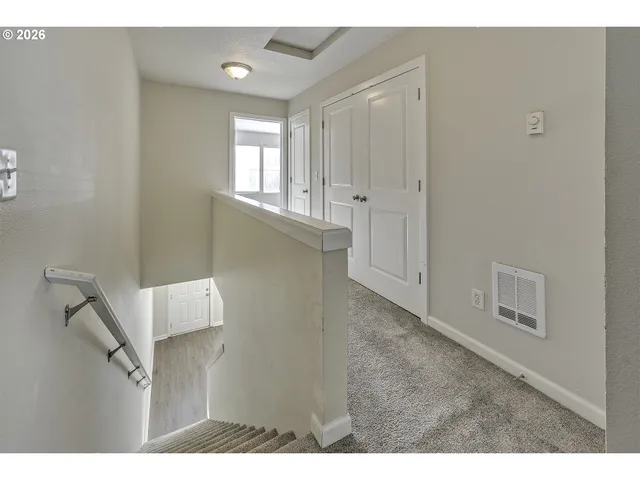 a view of an empty room and window