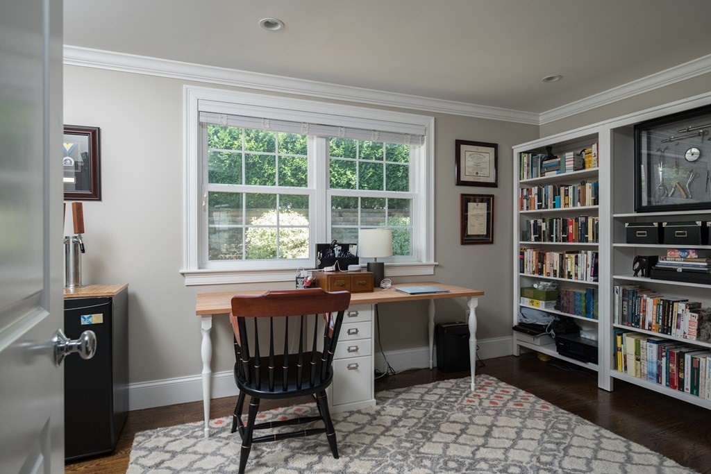 32 Westvale Road Milton, MA 02186 - Photo 15 of 36 a dining room with a bookshelf and a window