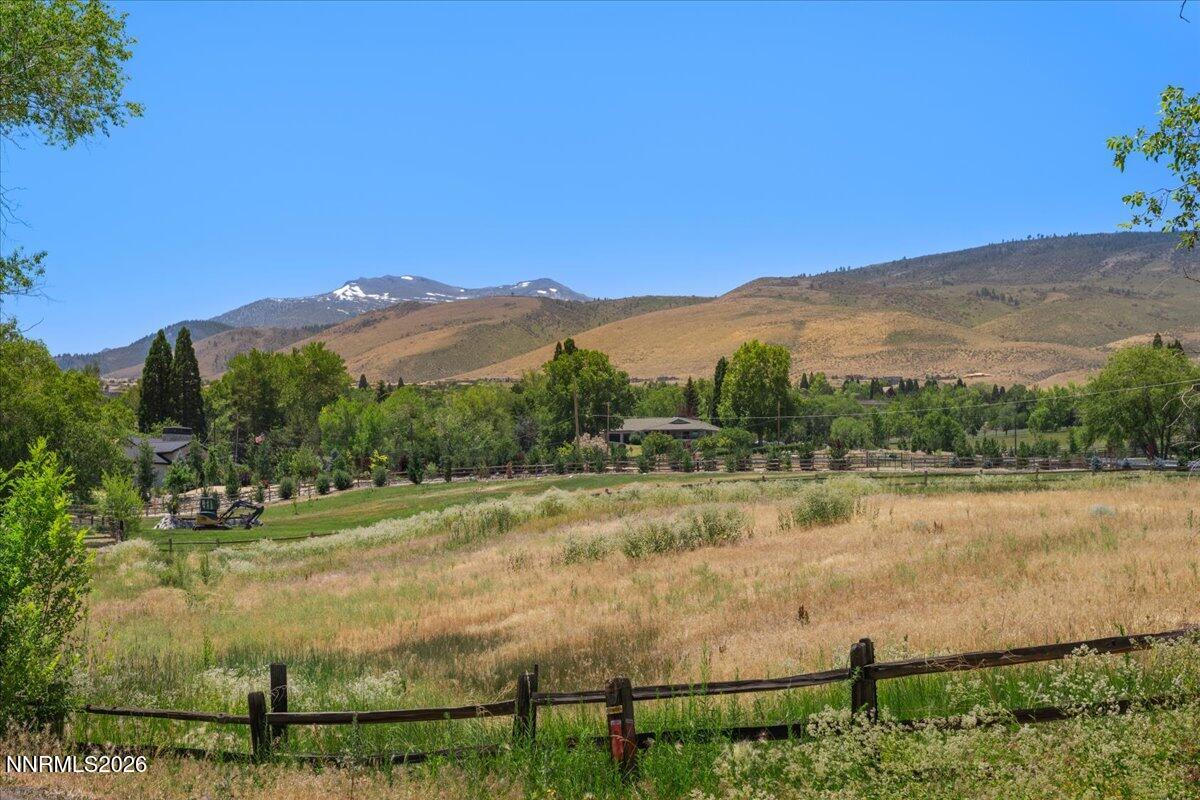 2800 Holcomb Ranch Lane Reno, NV 89511 - Photo 12 of 21 a view of a lake with mountains in the background