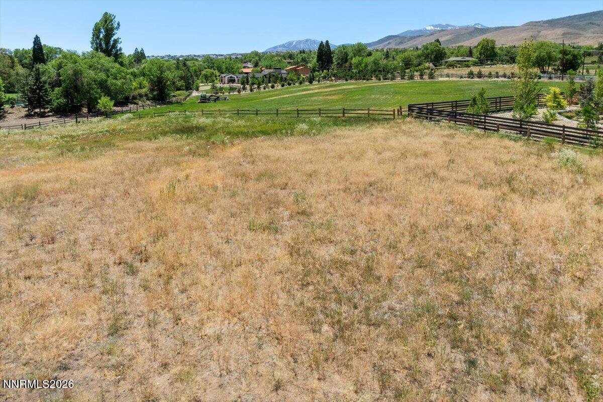 2800 Holcomb Ranch Lane Reno, NV 89511 - Photo 18 of 21 a view of a green field with clear sky