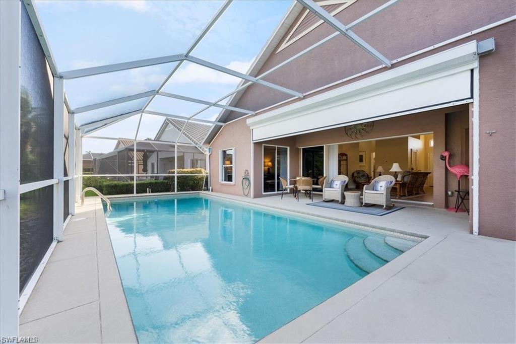 8432 Indian Wells Way Naples, FL 34113 - Photo 20 of 27 a view of a living room and livingroom