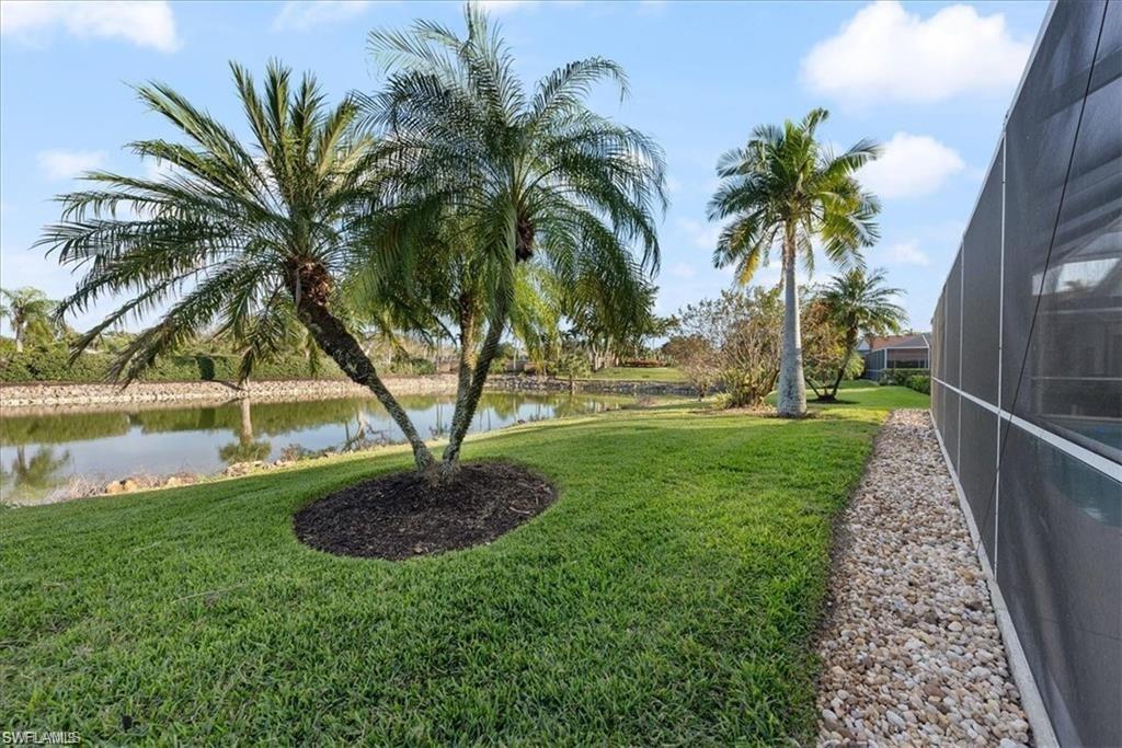 8432 Indian Wells Way Naples, FL 34113 - Photo 23 of 27 a view of a garden