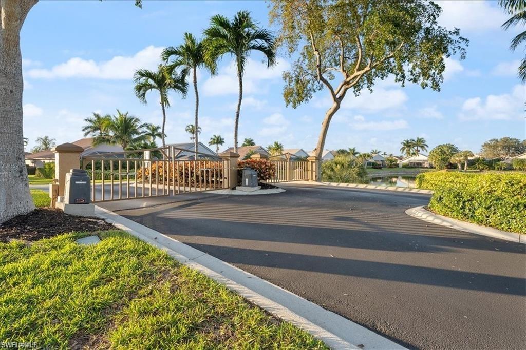 8432 Indian Wells Way Naples, FL 34113 - Photo 27 of 27 a view of a garden