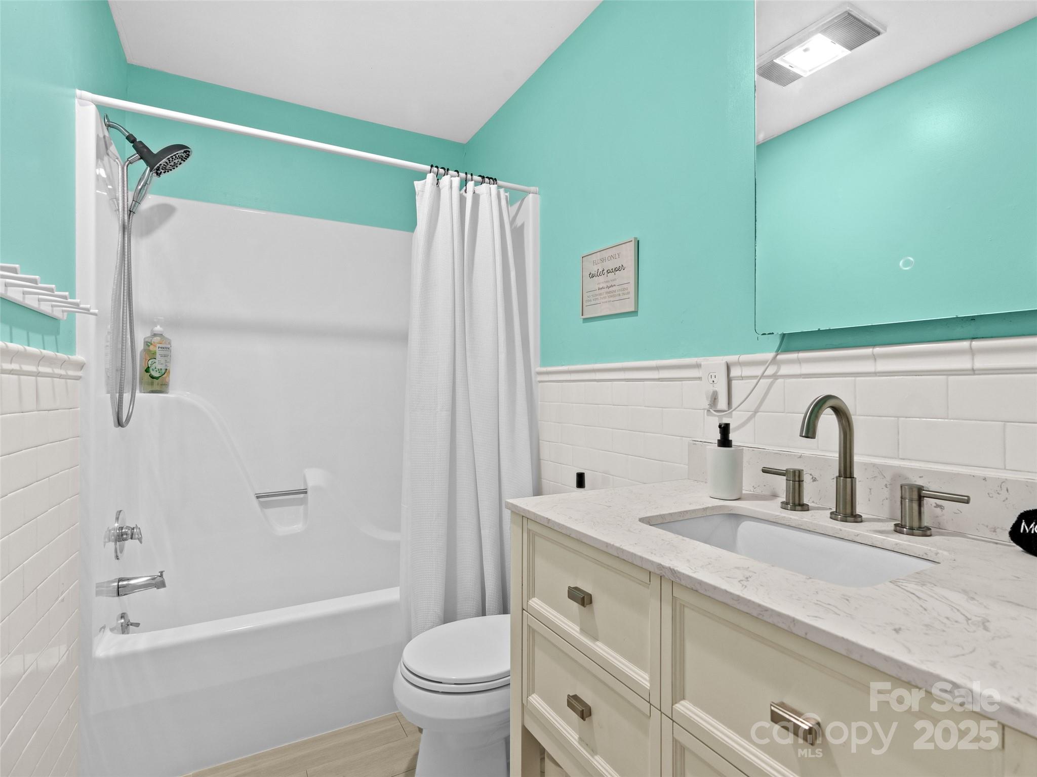 220 Deer Run Road Canton, NC 28716 - Photo 24 of 46 a bathroom with a sink and a mirror