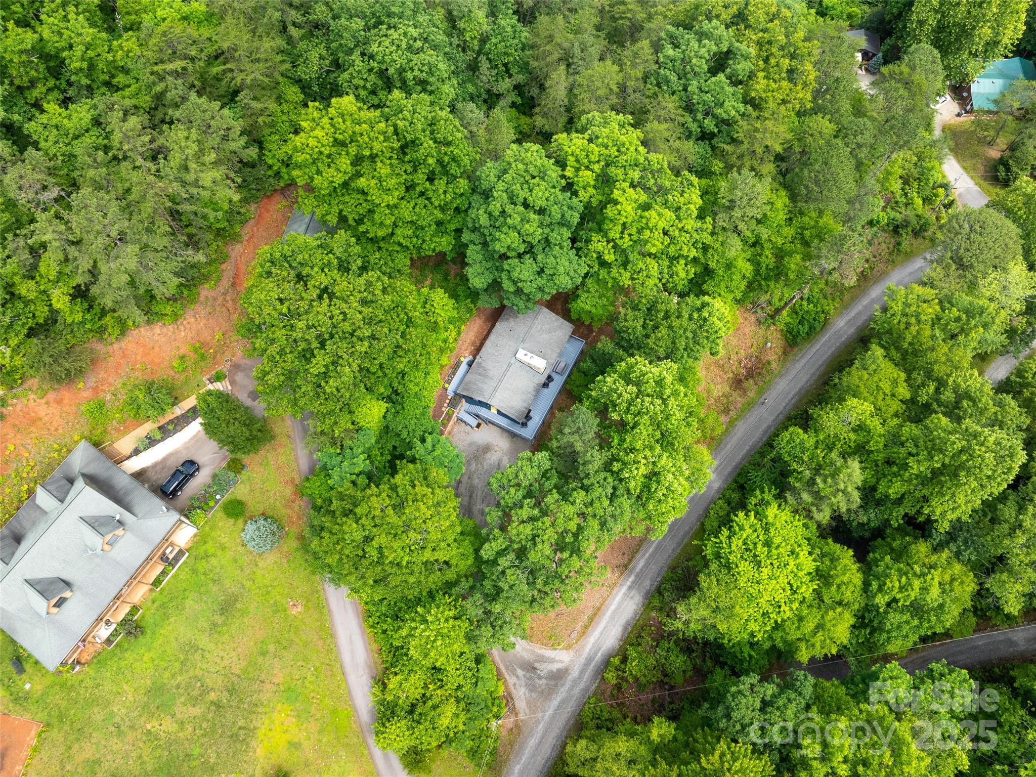 220 Deer Run Road Canton, NC 28716 - Photo 38 of 46 an aerial view of a house with a yard