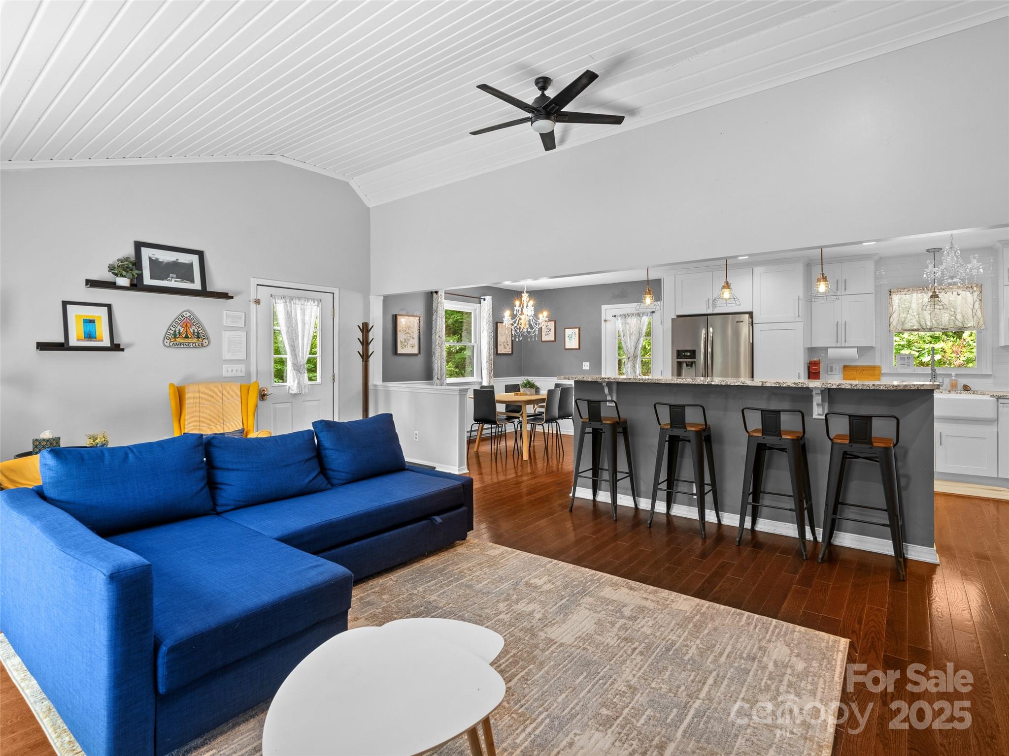 220 Deer Run Road Canton, NC 28716 - Photo 7 of 46 a living room with furniture wooden floor and a dining table