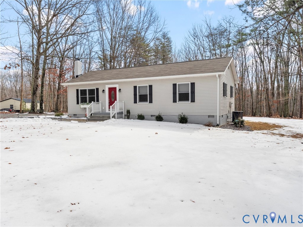 1339 Harris Creek Road Louisa, VA 23093 - Photo 4 of 42 a view of a house with snow on the road