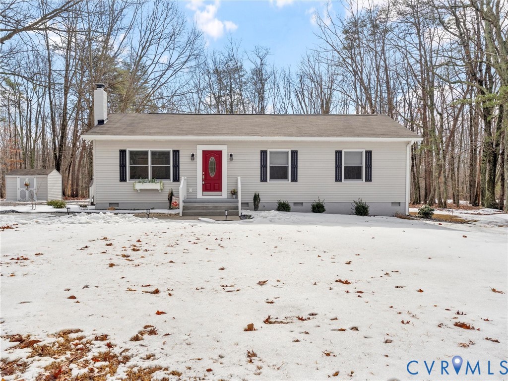 1339 Harris Creek Road Louisa, VA 23093 - Photo 5 of 42 a view of a house with snow on the road