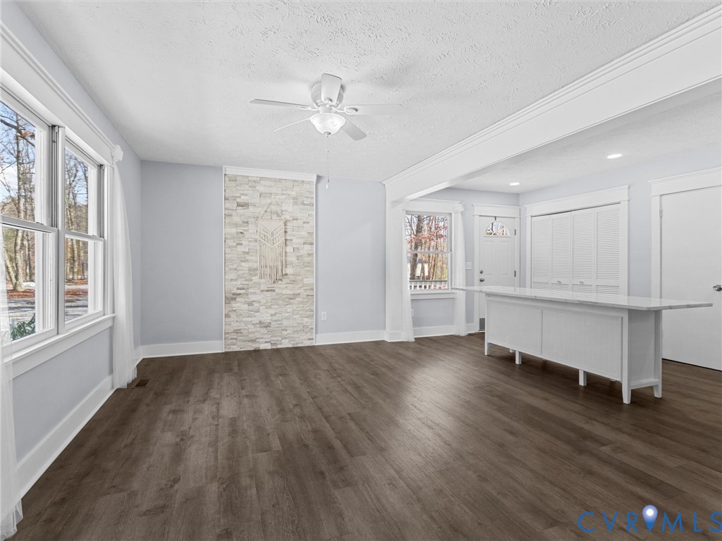1339 Harris Creek Road Louisa, VA 23093 - Photo 7 of 42 a view of an empty room with wooden floor and a window