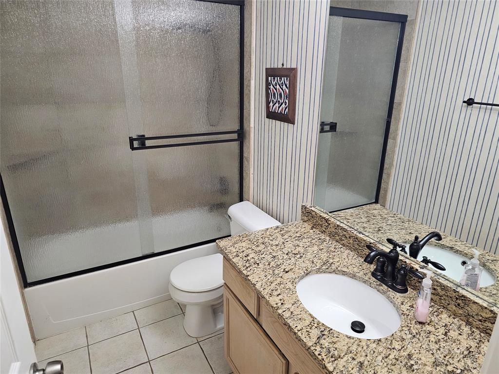 7783 Park Run Road Fort Worth, TX 76137 - Photo 17 of 20 Bath 2 with w updated Tile surround and fixtures