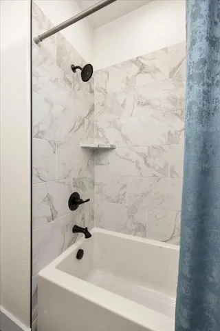 a bathroom with a bathtub