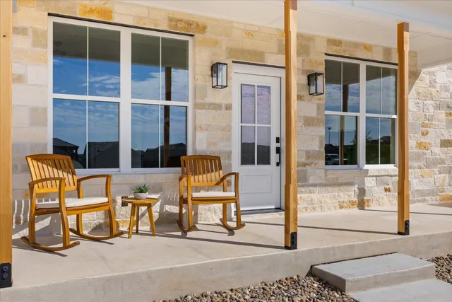 a building outdoor space with patio furniture