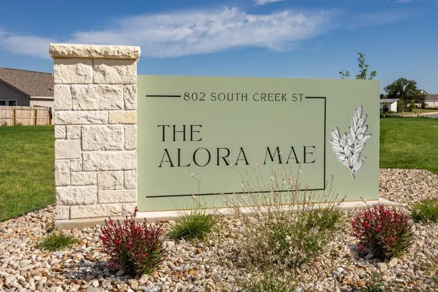 a sign on the side of building