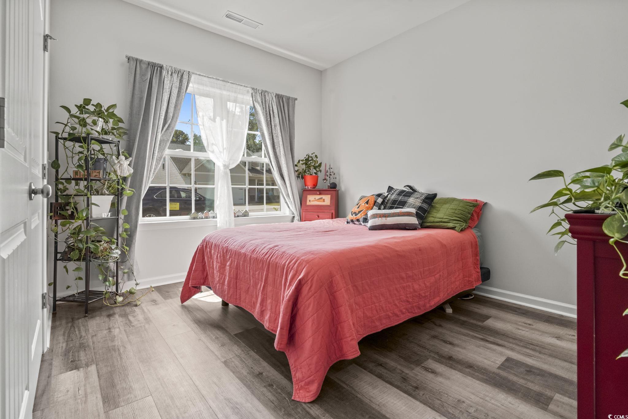 308 Concorde Drive Georgetown, SC 29440 - Photo 24 of 40 Bedroom with luxury vinyl plank floors