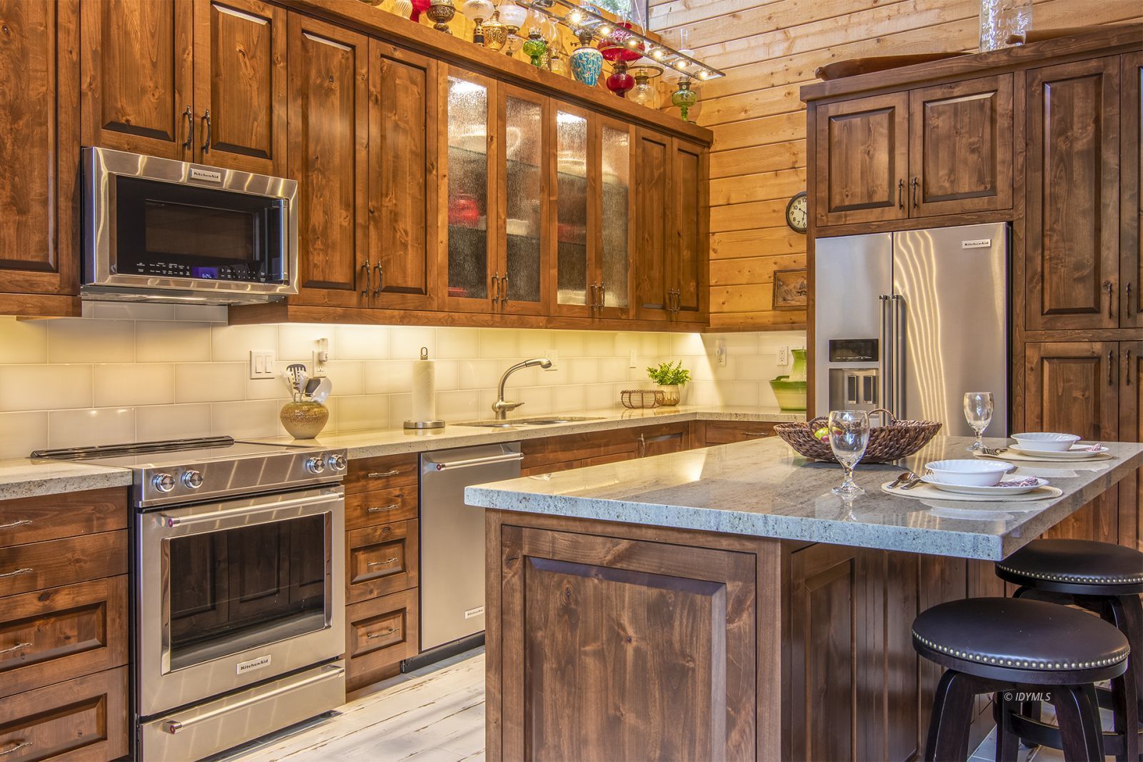 24924 Fern Valley Road Idyllwild, CA 92549 - Photo 11 of 44 a kitchen with stainless steel appliances a stove sink and microwave
