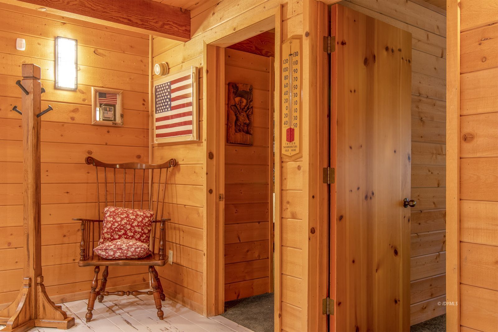 24924 Fern Valley Road Idyllwild, CA 92549 - Photo 36 of 44 a balcony with a chair and painted walls