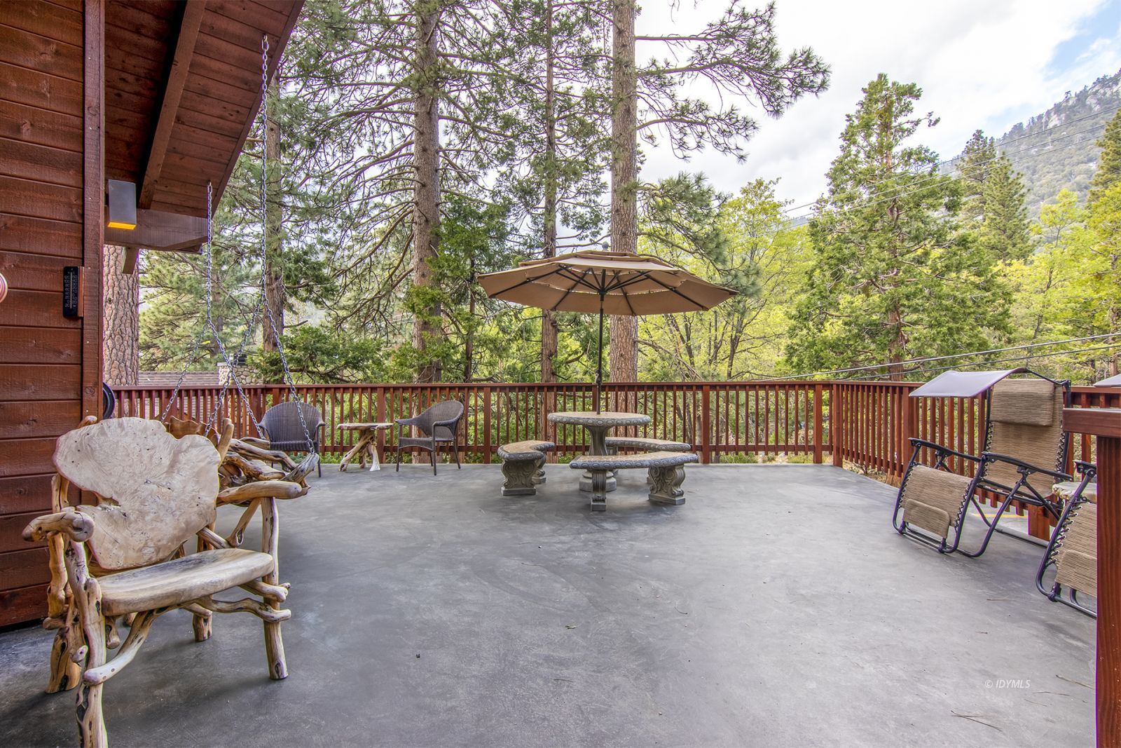 24924 Fern Valley Road Idyllwild, CA 92549 - Photo 5 of 44 a view of backyard with outdoor seating and trees