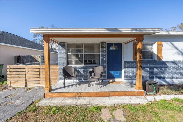 a view of a house with patio