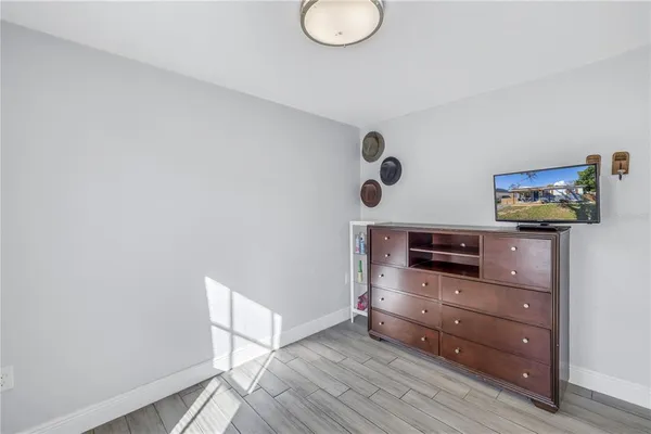 a view of workspace with wooden floor