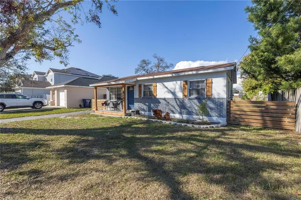 a view of a house with a big yard