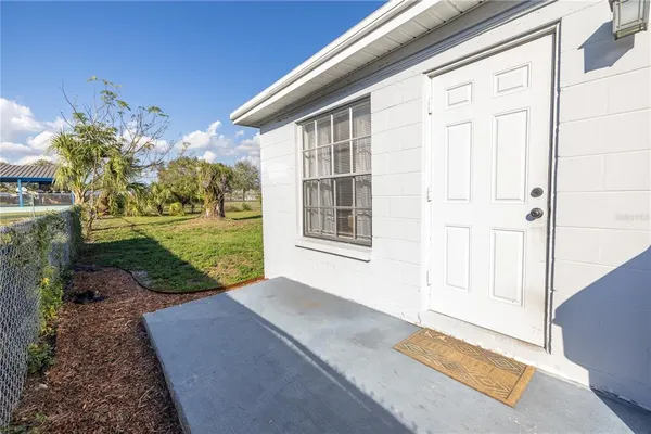 a view of a balcony with chairs