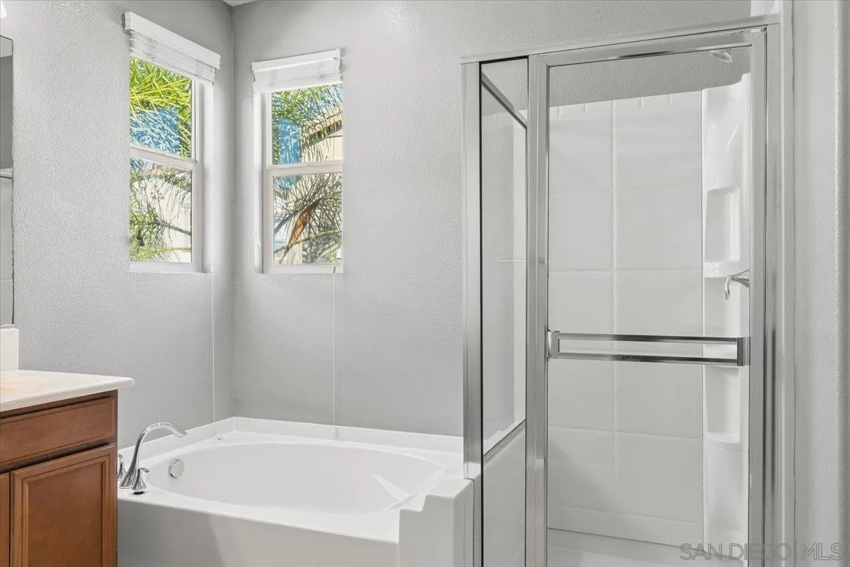 10034 Leavesly Trail Santee, CA 92071 - Photo 20 of 30 a white bath tub with a shower