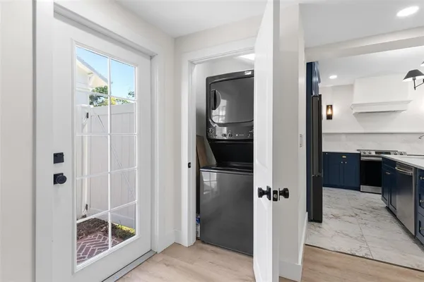 a view of a bathroom with a glass door shower and a sink