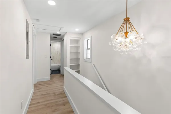 a bathroom with a tub and shower