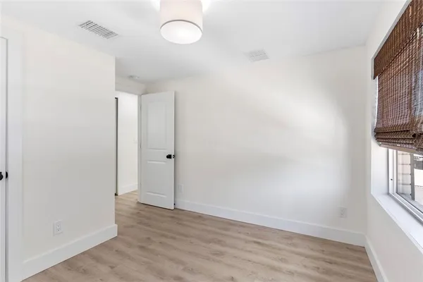a view of livingroom with hardwood floor and window