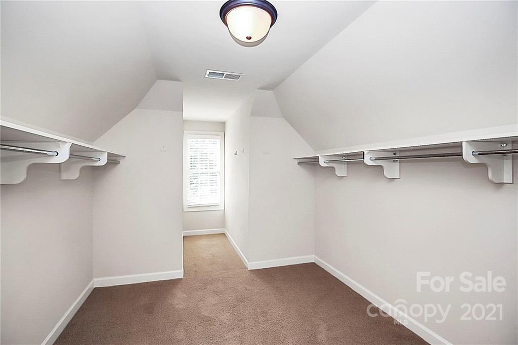 4080 Crepe Ridge Drive Denver, NC 28037 - Photo 20 of 34 a view of a room with racks on the wall
