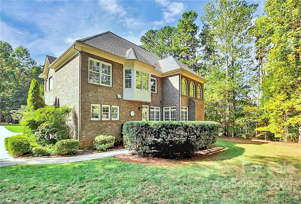 4080 Crepe Ridge Drive Denver, NC 28037 - Photo 26 of 34 a front view of a house with a yard