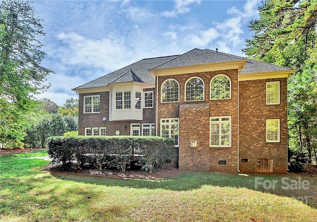 4080 Crepe Ridge Drive Denver, NC 28037 - Photo 27 of 34 a front view of a house with a yard