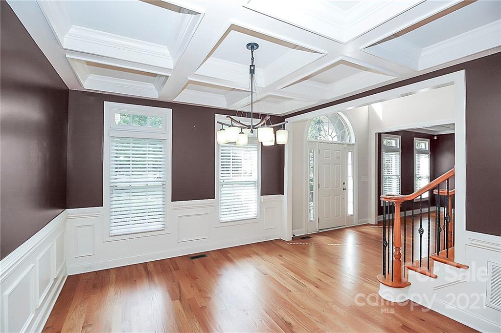 4080 Crepe Ridge Drive Denver, NC 28037 - Photo 5 of 34 a view of a room with wooden floor and stairs