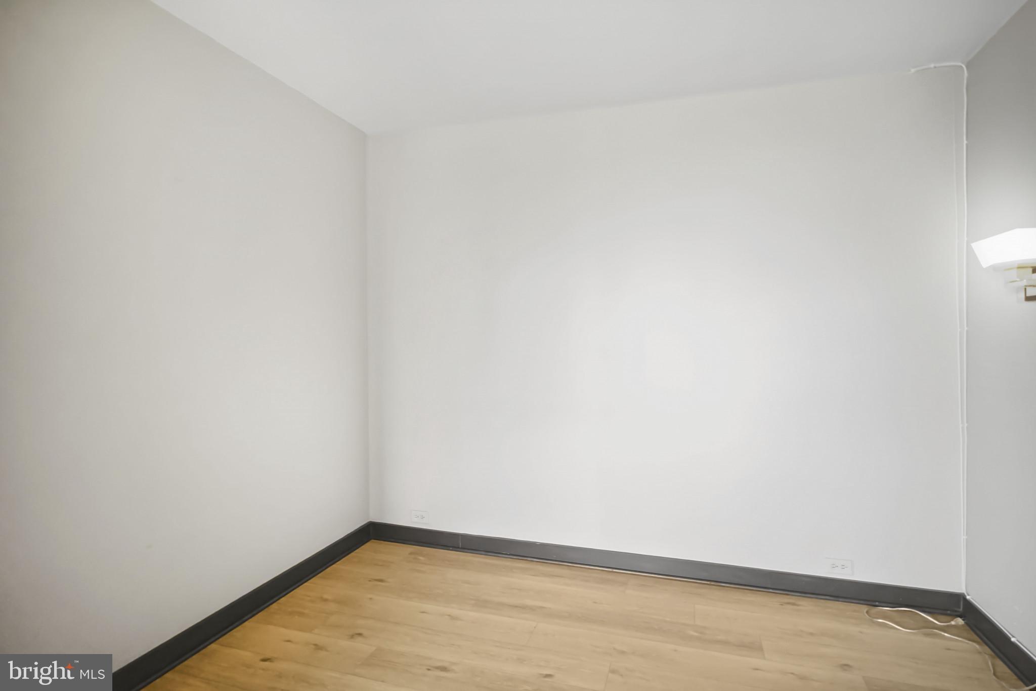 4000 North Charles Street, Unit 706 Baltimore, MD 21218 - Photo 7 of 23 a view of an empty room