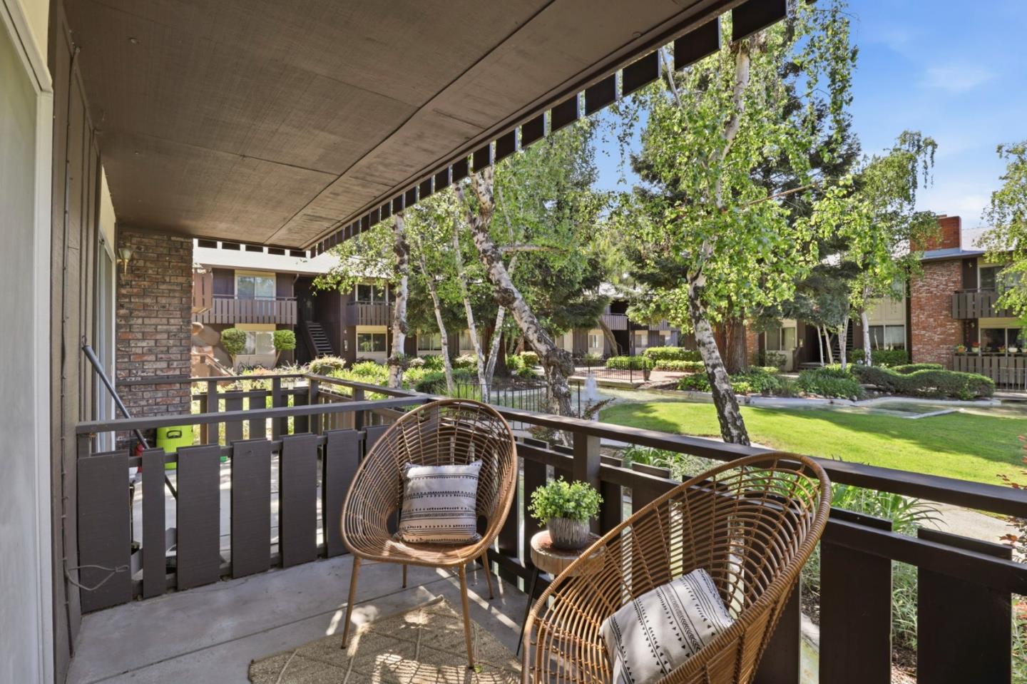 100 East Middlefield Road, Unit 3B Mountain View, CA 94043 - Photo 19 of 32 a view of a chairs and table in patio