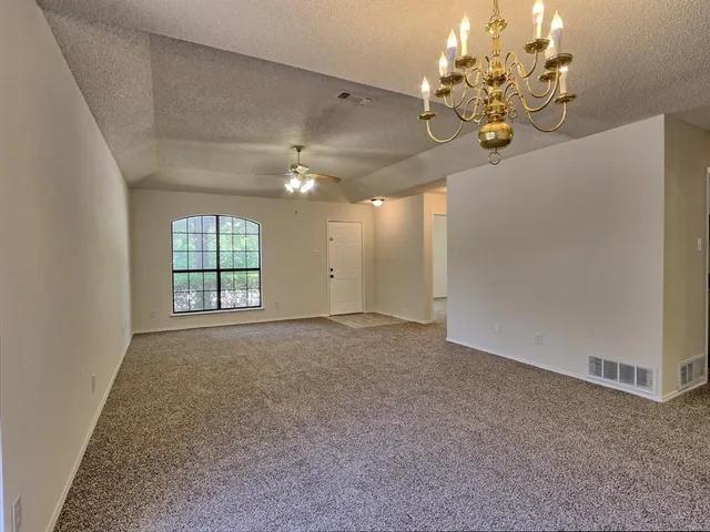 a view of a chandelier in a room