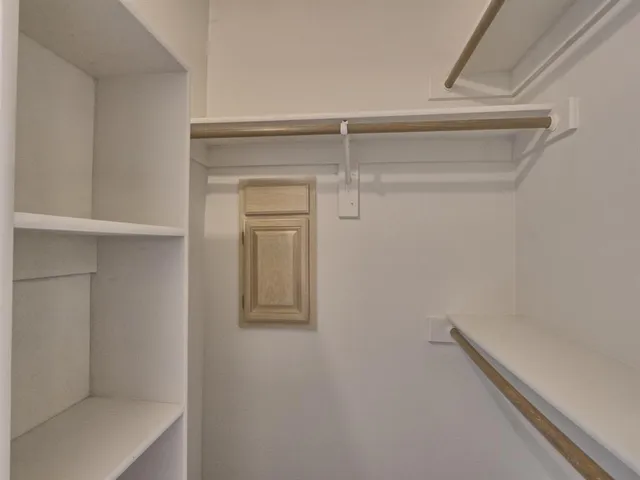 a view of a bathroom from a hallway