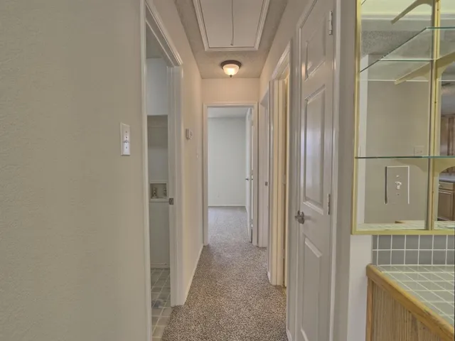 a bathroom with a sink toilet vanity and shower