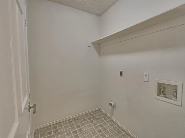 a view of a room with an empty space