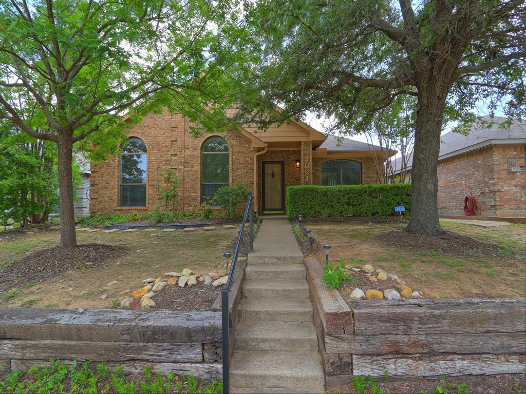 7021 Teal Drive Fort Worth, TX 76137 - Photo 3 of 24 Traditional-style home with brick siding