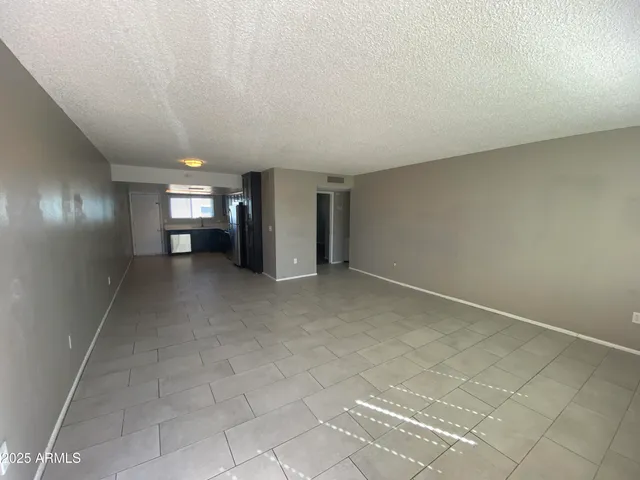 en empty room with windows