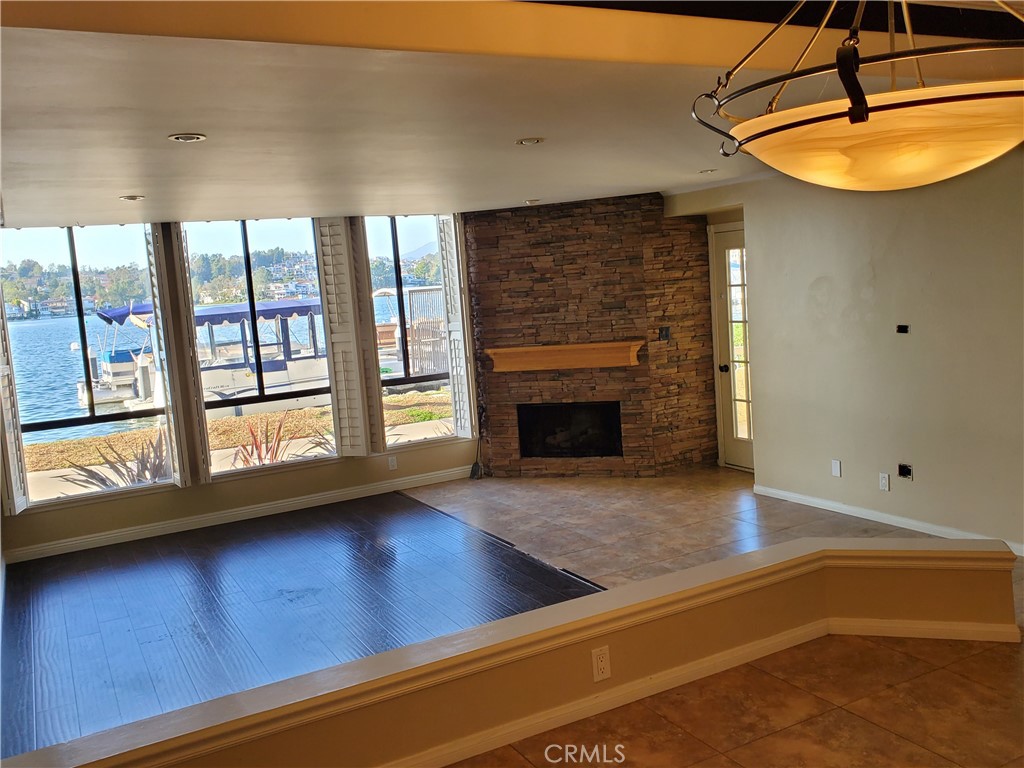 27795 Rota Mission Viejo, CA 92692 - Photo 18 of 27 a view of empty room with wooden floor and fireplace