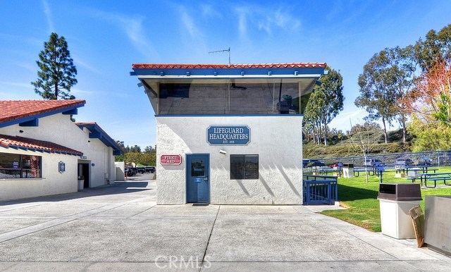 27795 Rota Mission Viejo, CA 92692 - Photo 21 of 27 a front view of a house with a garage