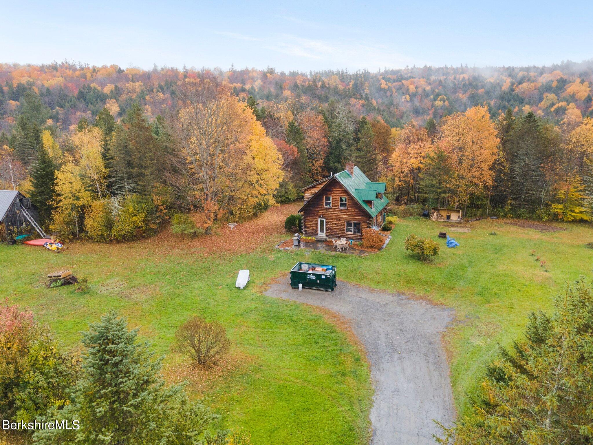 140 Windigo Road Windsor, MA 01026 - Photo 34 of 42 an aerial view of a house with a yard