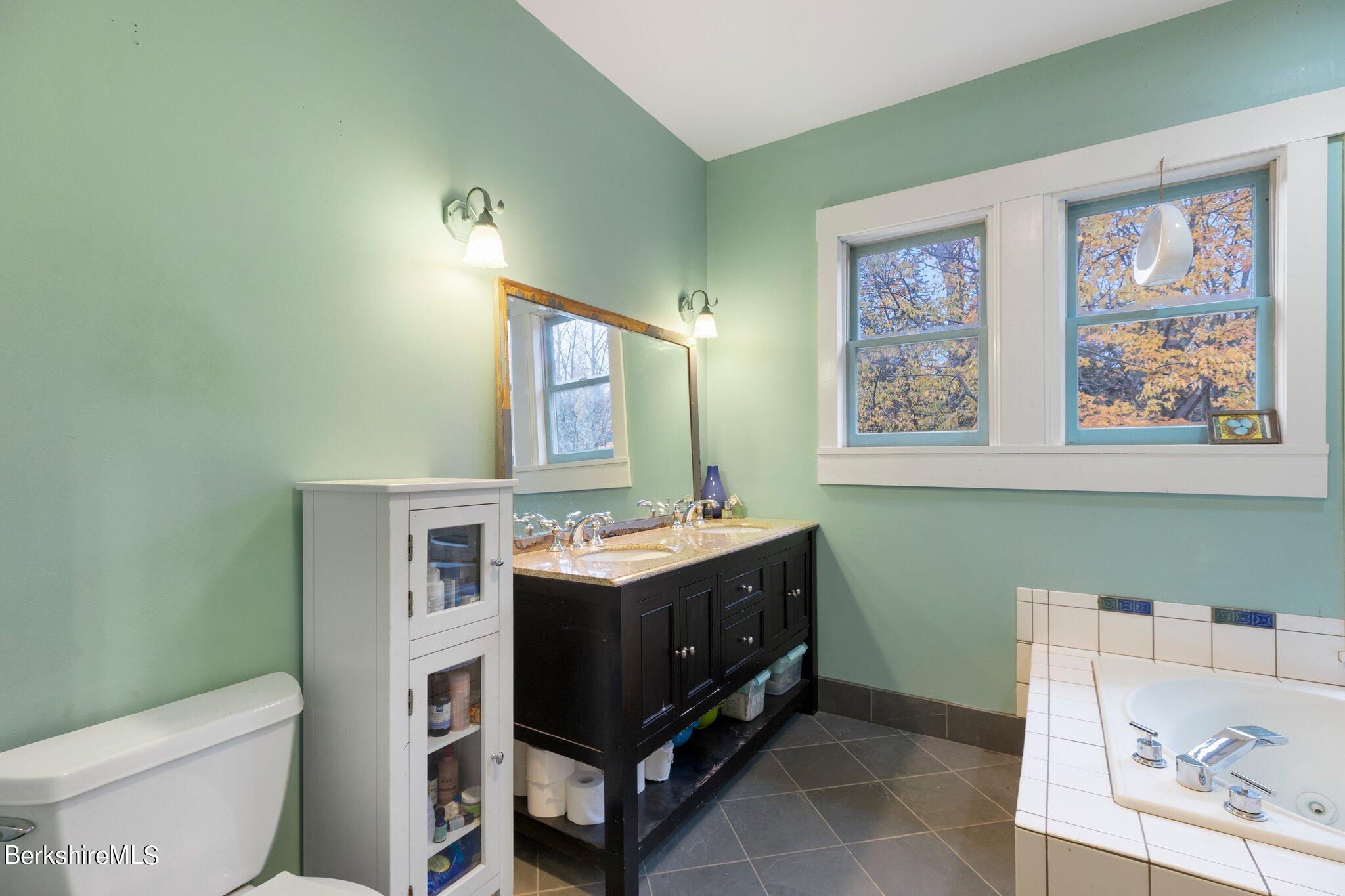 140 Windigo Road Windsor, MA 01026 - Photo 7 of 42 a bathroom with a toilet sink and mirror
