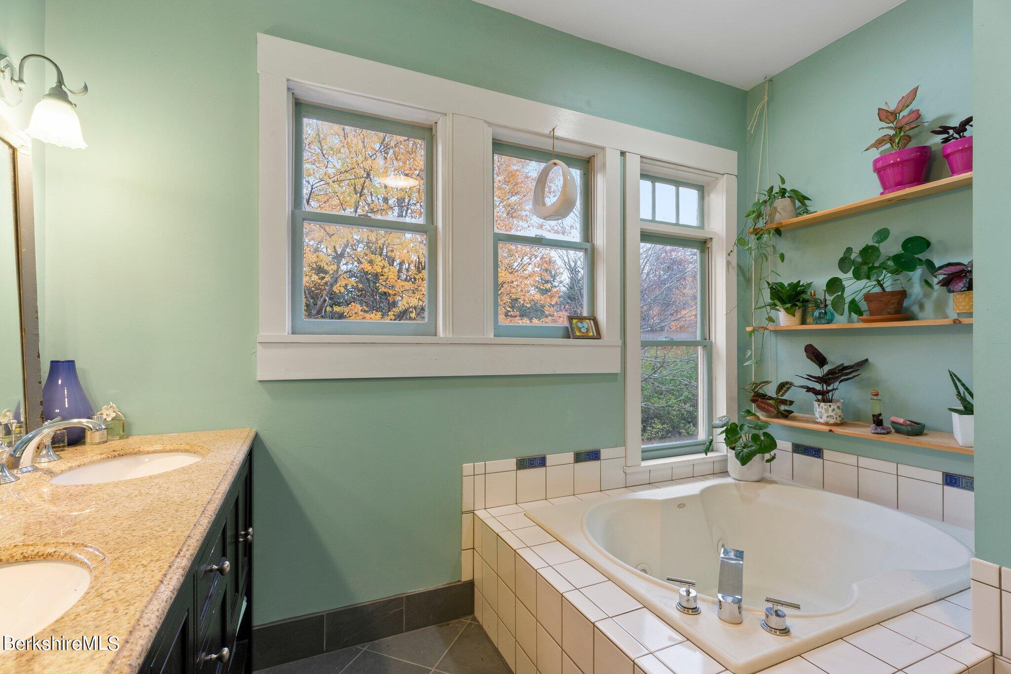 140 Windigo Road Windsor, MA 01026 - Photo 8 of 42 a bathroom with a tub sink and window
