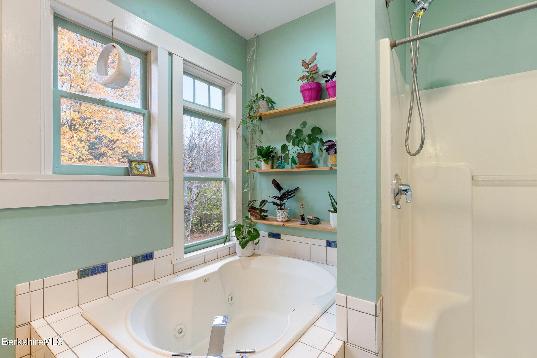 140 Windigo Road Windsor, MA 01026 - Photo 9 of 42 a bathroom with a tub and a shower