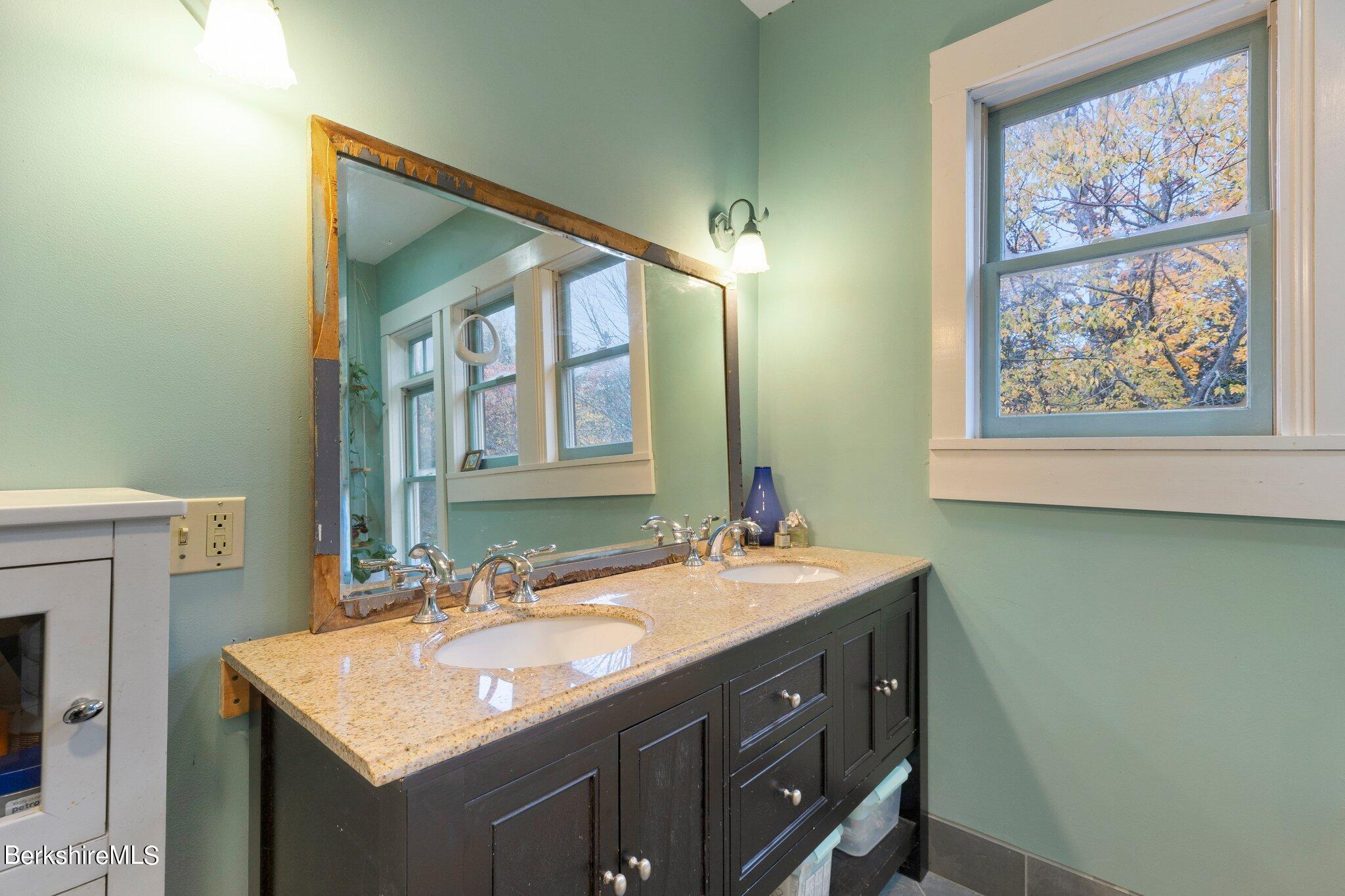 140 Windigo Road Windsor, MA 01026 - Photo 10 of 42 a bathroom with a sink and a mirror
