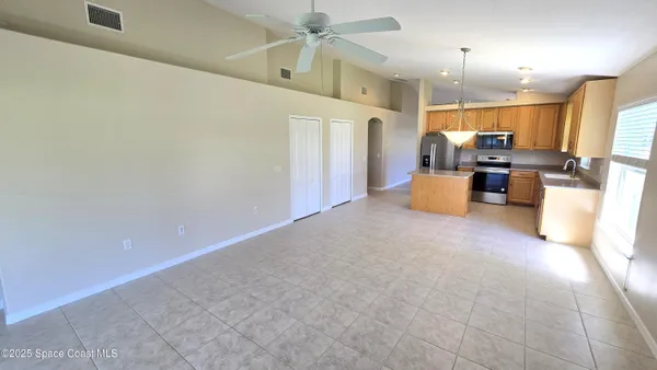 a view of a living room with furniture