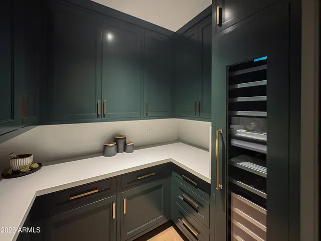 a bedroom with a bed and a fireplace